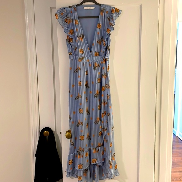 Astr Dresses & Skirts - Light blue floral wrap dress